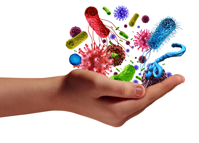 Una-mano-sosteniendo-celulas-microorganimos-tenemos