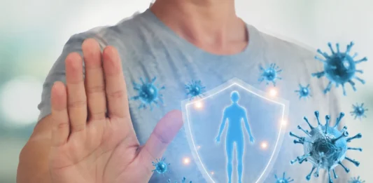 Ilustración realista del sistema inmunológico protegiendo el cuerpo frente a virus en una persona con diabetes, representación de las defensas del organismo